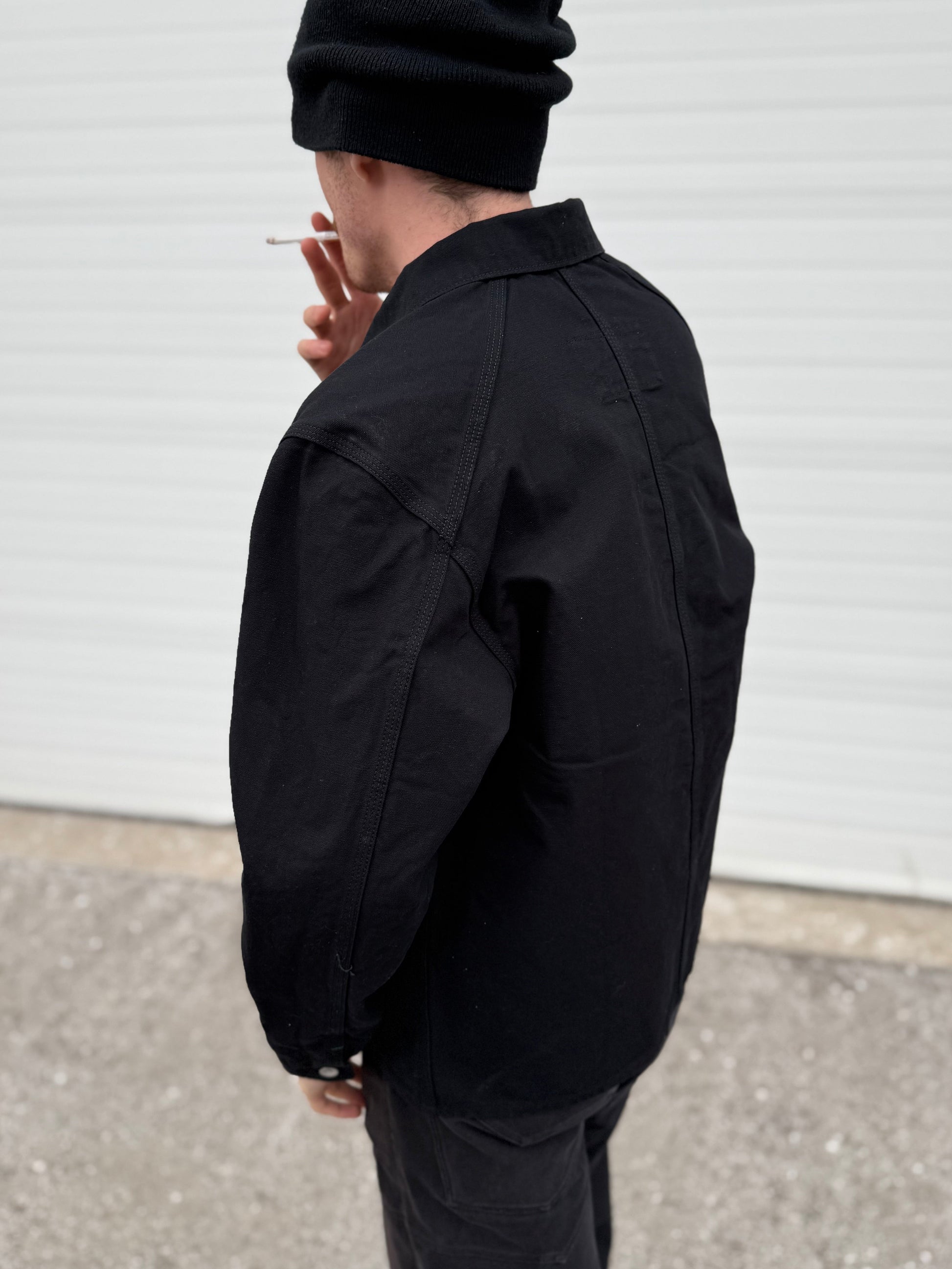 Keymaster black chorecoat back and sleeve detail